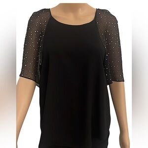 Rebecca Taylor black top with a crystal sleeves